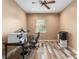 Home office with hardwood floors, natural light from the window and recessed lighting at 5995 Se 22Nd Ave, Ocala, FL 34480