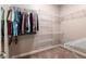 Walk-in closet with adjustable metal shelving and ample storage space at 5995 Se 22Nd Ave, Ocala, FL 34480