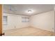 This light and airy bedroom is adorned with wood plank flooring, neutral colors and multiple windows at 711 Se 26Th St, Ocala, FL 34471