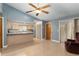 A view of the kitchen, dining and living area at 711 Se 26Th St, Ocala, FL 34471