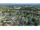 Aerial view of the community featuring tree-lined streets and well-maintained homes at 912 Chula Ct, Lady Lake, FL 32159