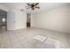 Main bedroom featuring tile flooring and ensuite bathroom access at 912 Chula Ct, Lady Lake, FL 32159