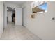 Mud room with tile flooring, connections and natural light at 912 Chula Ct, Lady Lake, FL 32159