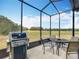 Enjoy an evening barbecue on this screened in lanai with great views at 9697 Sw 63Rd Loop, Ocala, FL 34481