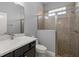 Beautiful bathroom with a tiled shower and tub, plus a large vanity at 10138 Lake Miona Way, Oxford, FL 34484