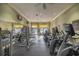 Well-equipped fitness center with modern machines, providing a convenient space for staying active and healthy at 10138 Lake Miona Way, Oxford, FL 34484