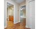 Hallway showing doors to bathroom, bedroom, and closet at 10215 Sw 134Th Ct, Dunnellon, FL 34432