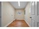 Laundry room with a window, utility connections and wood-look flooring at 10215 Sw 134Th Ct, Dunnellon, FL 34432