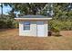 An external shed sits detached from the main house at 10215 Sw 134Th Ct, Dunnellon, FL 34432