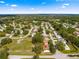 Wide aerial view of the property, highlighting the surrounding neighborhood and community features at 11620 Sw 84Th Avenue Rd, Ocala, FL 34481