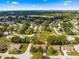 Beautiful aerial view of a home in a serene community with abundant trees and landscaping at 11620 Sw 84Th Avenue Rd, Ocala, FL 34481