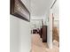 Hallway featuring neutral carpet, natural lighting and functional design at 11620 Sw 84Th Avenue Rd, Ocala, FL 34481