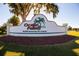 Ocala Palms Golf Community for Adults sign displayed on a manicured lawn at 1921 Nw 50Th Cir, Ocala, FL 34482