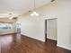 Spacious living room featuring sleek hardwood floors and ample natural light at 1921 Nw 50Th Cir, Ocala, FL 34482