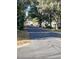 A peaceful street view lined with mature trees and a residential neighborhood at 2259 Nw 2Nd Ave, Ocala, FL 34475