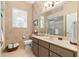 Well-lit bathroom with a single vanity, neutral color palette and shower at 2310 Nw 59Th Ave, Ocala, FL 34482