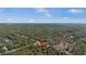 Aerial view of a house with red marker among a dense forest at 23761 Sw Plaza Ct, Dunnellon, FL 34431