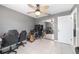 Bedroom boasts tile floors, ceiling fan, and large closet space at 2620 Sw 152Nd Ln, Ocala, FL 34473