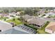 Residential area featuring single-Gathering homes, mature trees, and vibrant green spaces in a tranquil community at 3001 Rugby Way, The Villages, FL 32162