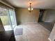 Bright dining area with tile flooring and sliding glass doors to outdoor patio at 3044 Sw 168Th Loop, Ocala, FL 34473