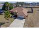 An aerial view of the home displaying the long driveway and 2 car garage at 3994 Sw 102Nd Pl, Ocala, FL 34476