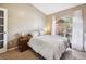 Cozy bedroom featuring a large window and neutral color palette at 3994 Sw 102Nd Pl, Ocala, FL 34476