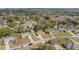 An aerial view of the neighborhood showing homes on tree lined streets with spacious lawns at 4837 Ne 5Th Street Rd, Ocala, FL 34470