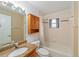 Traditional bathroom with tiled walls, granite sink, and tub with shower at 4837 Ne 5Th Street Rd, Ocala, FL 34470