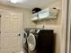 Convenient laundry room equipped with modern washer and dryer units at 5765 Sw 164Th Pl, Ocala, FL 34473