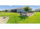 Backyard view with a lush green lawn, mature landscaping, and well-maintained exterior at 8107 Sw 92Nd Cir, Ocala, FL 34481