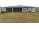 Exterior view of screened lanai in the rear of the home at 8107 Sw 92Nd Cir, Ocala, FL 34481