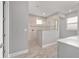 Modern bathroom featuring a walk-in shower with tiled walls and floors and a decorative glass partition at 8107 Sw 92Nd Cir, Ocala, FL 34481