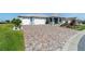 Home with a multi-car garage and a custom brick driveway and meticulously maintained landscaping at 8107 Sw 92Nd Cir, Ocala, FL 34481