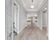 Bright foyer featuring wood-look tile floors, recessed lighting, and an open floor plan at 8107 Sw 92Nd Cir, Ocala, FL 34481