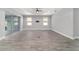 Airy living room featuring recessed lighting, sliding doors to the patio, and a ceiling fan at 8107 Sw 92Nd Cir, Ocala, FL 34481