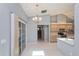 Kitchen and dining area with tile flooring, stainless steel appliances and lots of natural light at 8231 Sw 108Th Loop, Ocala, FL 34481