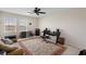 Bedroom with multiple windows, ceiling fan and area rug at 8953 Sw 50Th Ter, Ocala, FL 34476