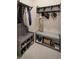 Mudroom with convenient bench seating, storage cubbies, and coat hooks at 8953 Sw 50Th Ter, Ocala, FL 34476