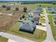 Aerial view of homes in a neighborhood with pools and fences at 9105 Se 55Th Ter, Ocala, FL 34480