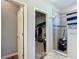 Bathroom displaying a tiled shower, closet, and gray paint at 9105 Se 55Th Ter, Ocala, FL 34480