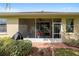 The backyard of this home includes an exterior view featuring a screened lanai, providing a relaxing outdoor living space at 9274 Sw 94Th Loop, Ocala, FL 34481