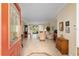 Open foyer leading to a spacious living room with tile flooring and a view of the outdoor patio at 9274 Sw 94Th Loop, Ocala, FL 34481