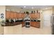 Beautiful kitchen with granite countertops, stainless steel appliances, and ample cabinet space at 9274 Sw 94Th Loop, Ocala, FL 34481