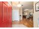 Inviting foyer with wood laminate floors that open to a cozy living room at 1029 Sw 157Th Ln, Ocala, FL 34473