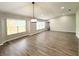 Bright living room with expansive windows, neutral tones, and modern flooring at 11484 Sw 76Th Cir, Ocala, FL 34476