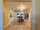 Open dining room with tile floors, stylish decor, and lots of natural light at 13718 Sw 40Th Cir, Ocala, FL 34473