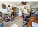 Home office featuring tile floors, natural light, and adjacent room access through sliding doors at 13718 Sw 40Th Cir, Ocala, FL 34473