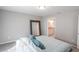 Bedroom with large mirror and view to bathroom at 1482 Ne 160Th Pl, Citra, FL 32113