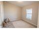 Cozy bedroom with a plush gray carpet and a geometric patterned area rug at 1482 Ne 160Th Pl, Citra, FL 32113