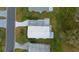 Aerial view highlighting the home's roof, landscaping, and driveway within the community at 1541 Hillcrest Dr, Lady Lake, FL 32159